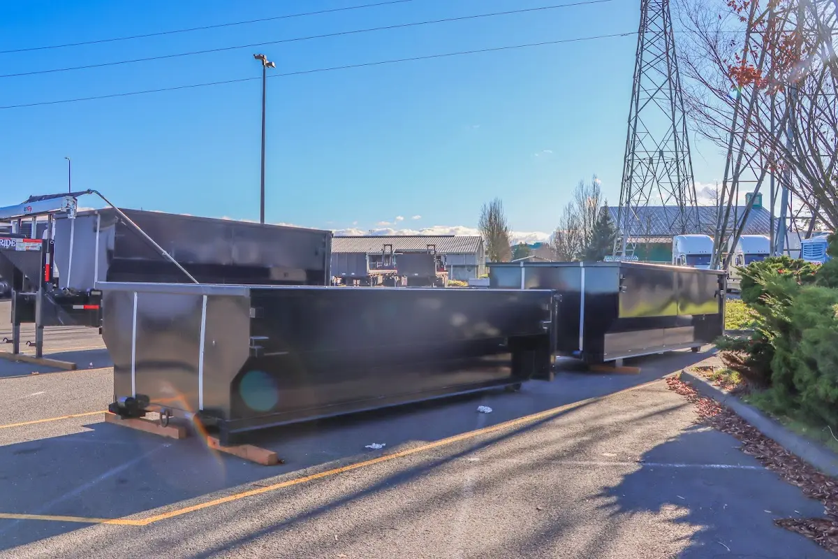 Roll-off dumpster ready for waste disposal at job site for 4 Yard Dumpster Rental in Cambria